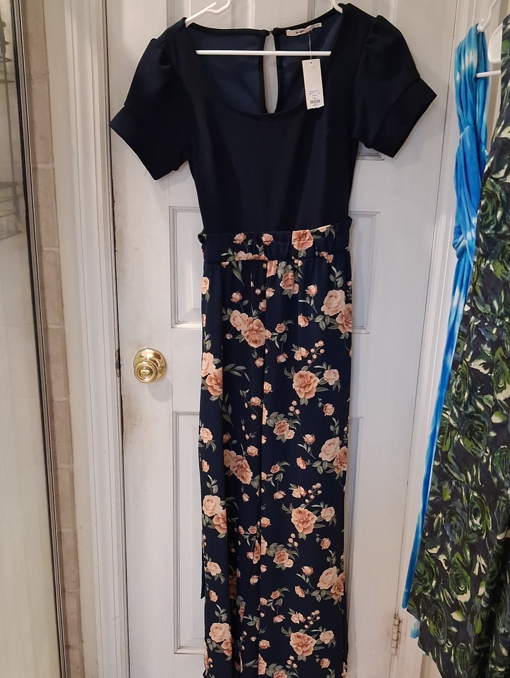 Francesca's Navy Scoop Neck Floral Print Jumpsuit